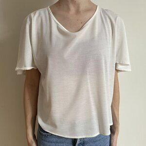 Cream/white T-shirt with fluffy short sleeves